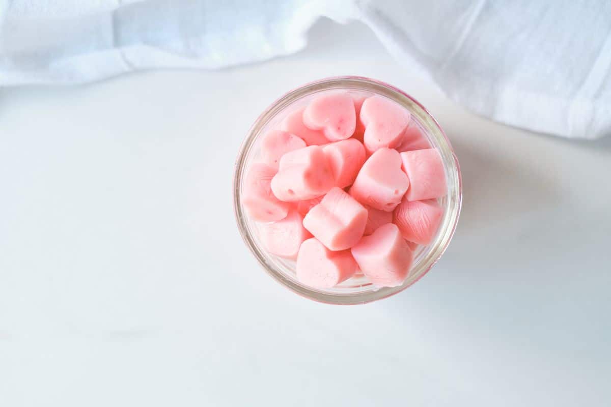 homemade frozen yogurt dog treats strawberry flavored in glass jar